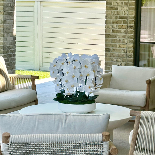 Waterfall style faux orchid arrangement